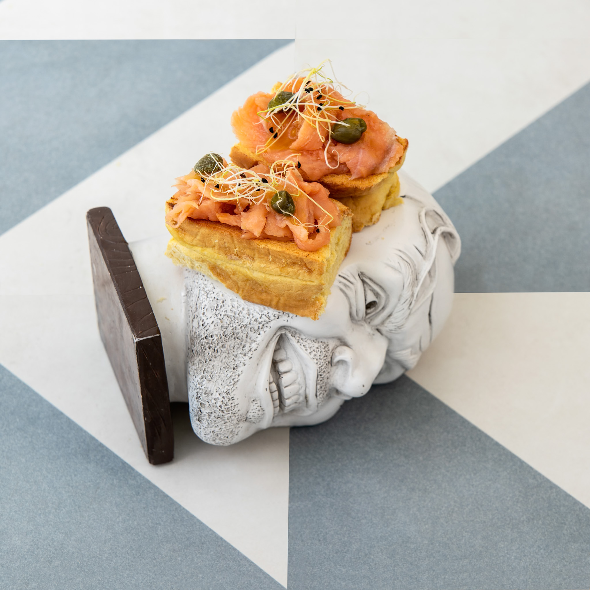 "The Shining" Salmon brioche with mustard, caper and honey. 