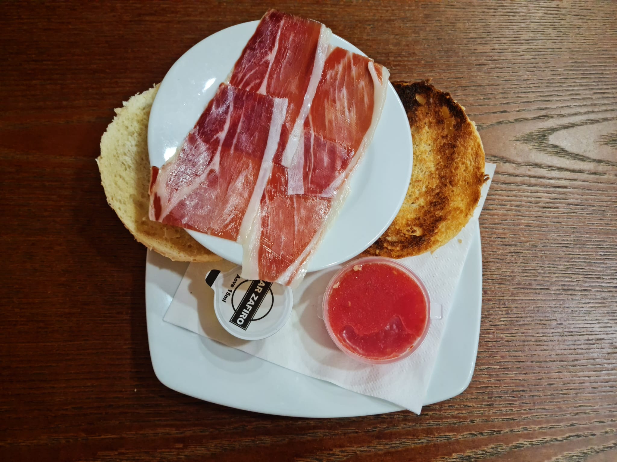 Toasted bread, Iberian ham, oil and tomato