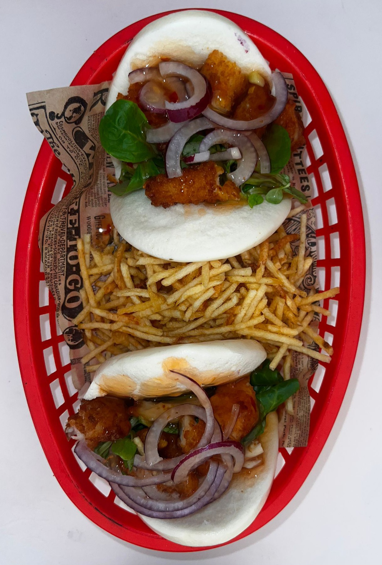 Mini retinto burger with barbecue sauce, bacon, fried onion, quail egg bathed in mild cheese sauce (unit)