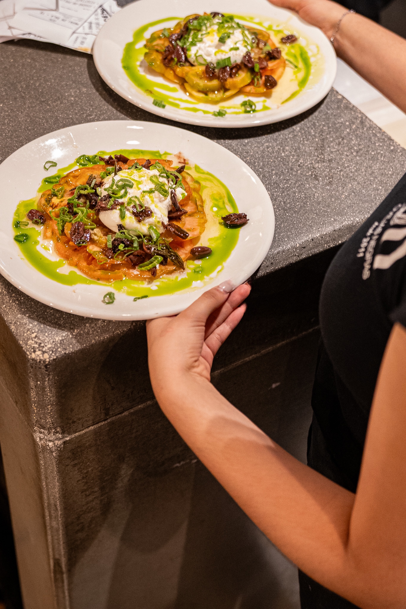 Tomato salad, burrata, kalamata and shallot vinaigrette
