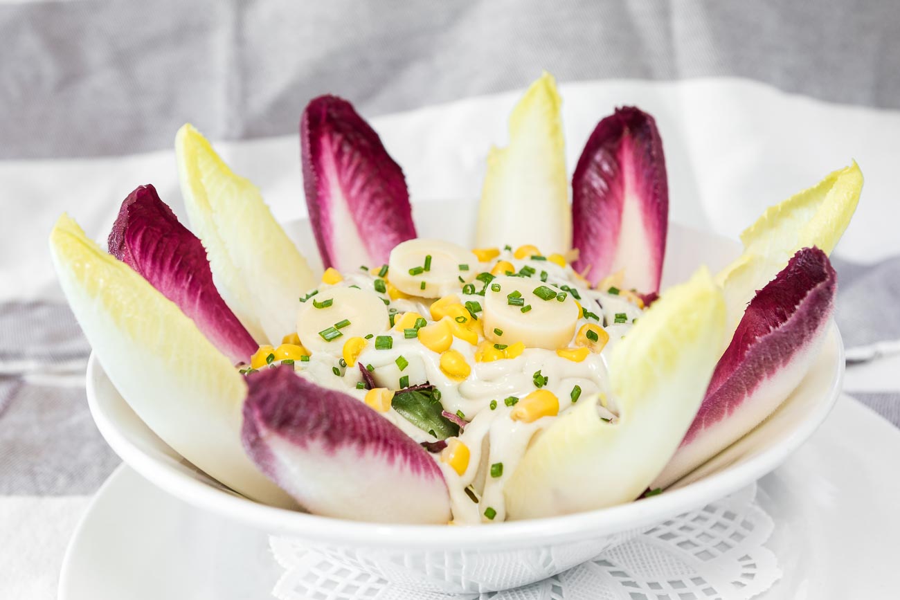 Chicory, palm hearts and sweetcorn salad with a smooth roquefort cheese sauce