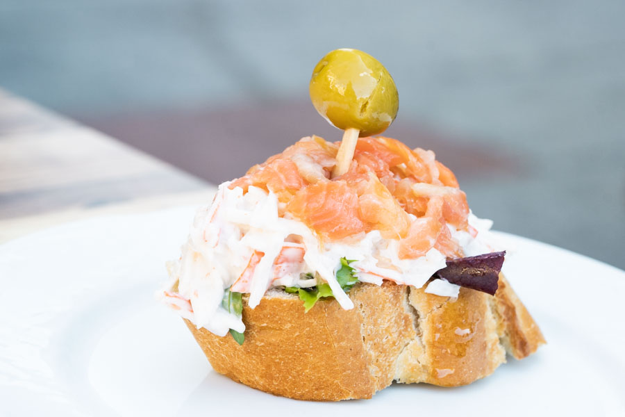 Crab with mayonnaise, smoked salmon, on bread