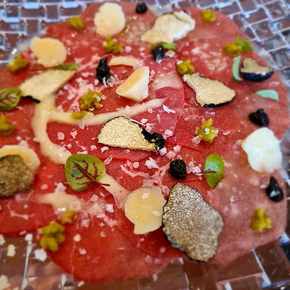 Beef carpaccio with parmesan cheese 