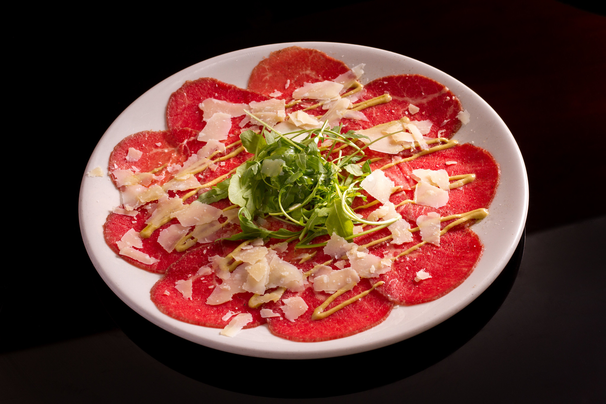 Beef carpaccio with parmesan and arugula