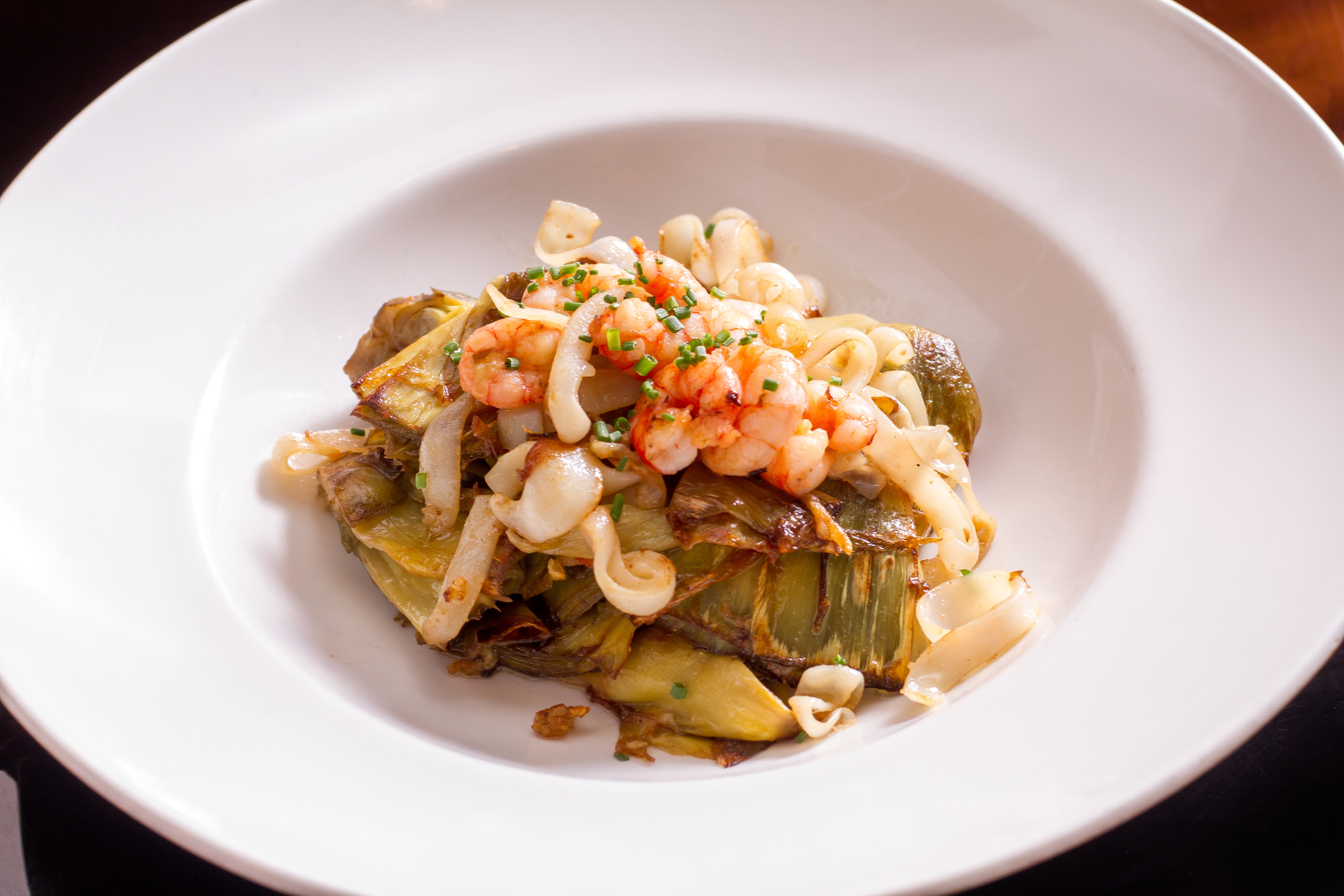 Artichokes with cuttlefish and prawns