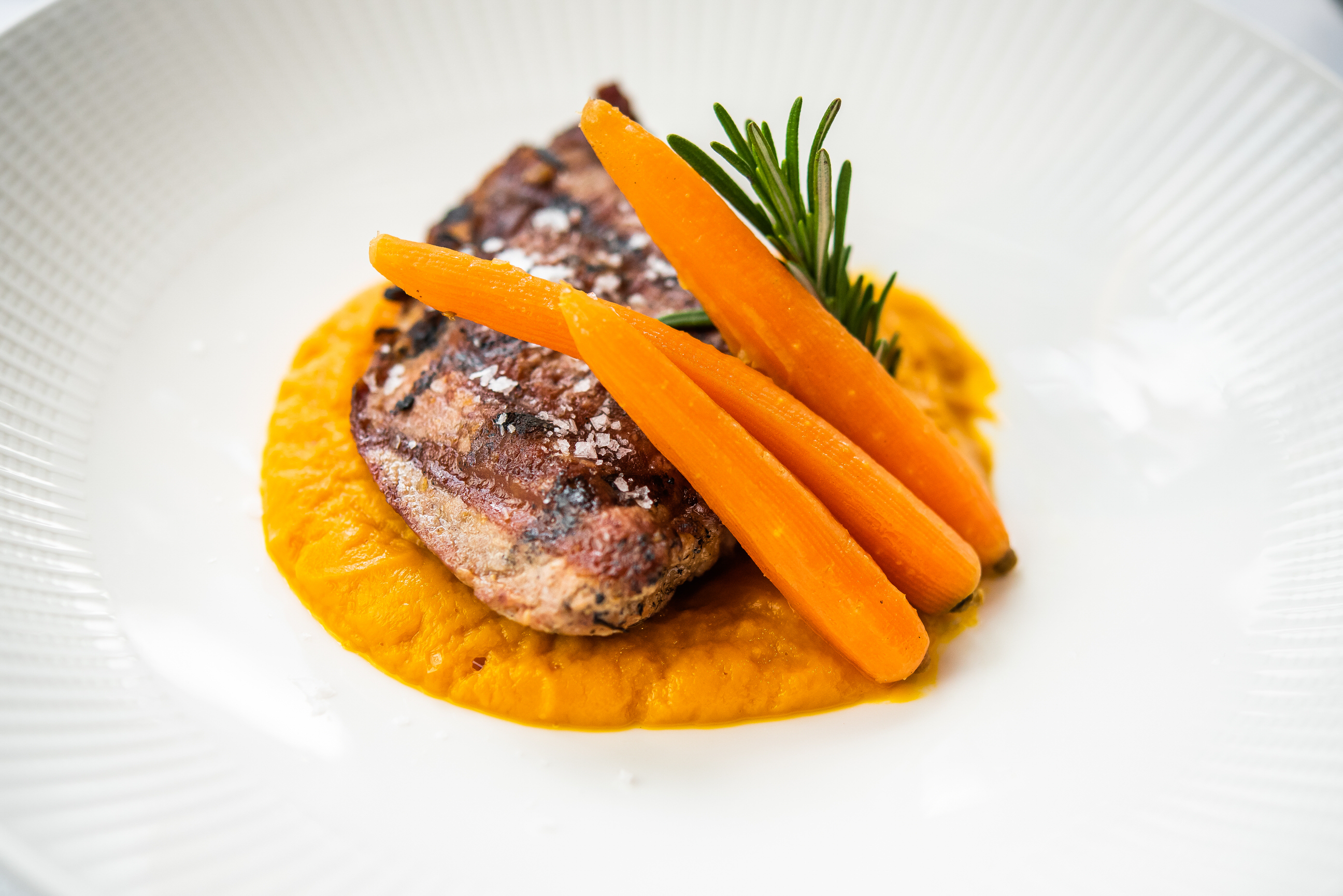 Grilled Iberian pork with spiced carrot purée