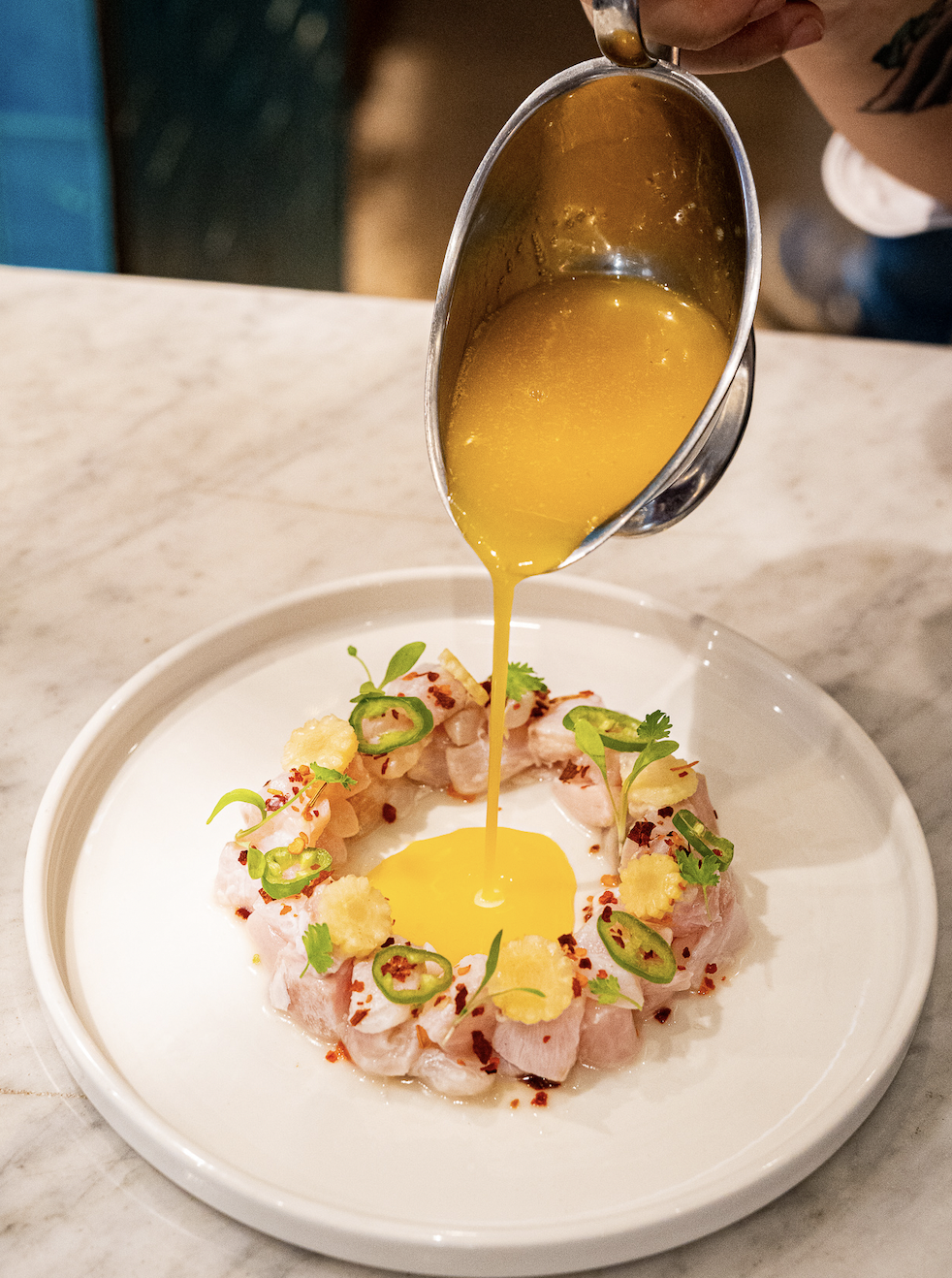 Corvina ceviche with passion tiger milk and jalapeños