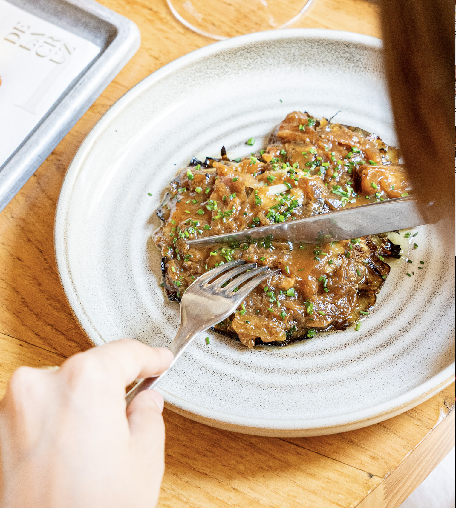 Grilled artichoke with whiskey sauce and roasted garlic toffee