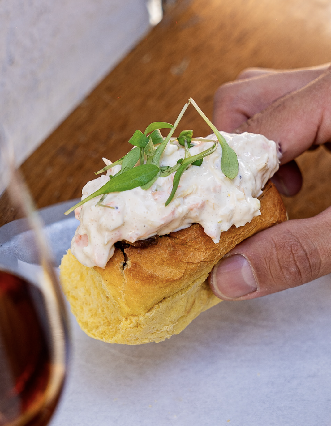 Brioche with pulled pork and coleslaw salad