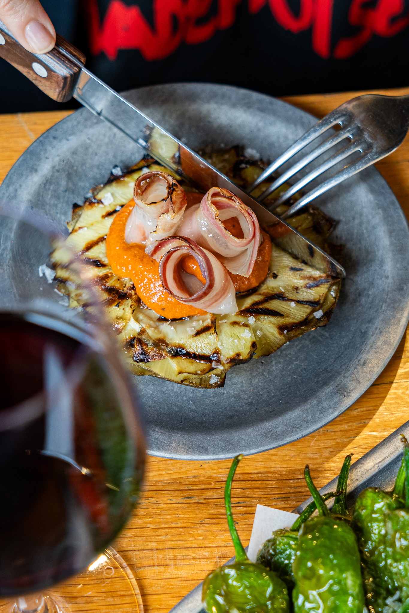 Grilled artichoke, romescu and cured Iberian potatoes