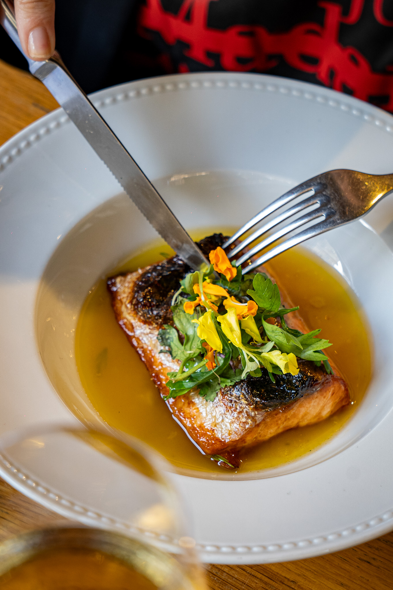 Grilled salmon, citrus vinaigrette and sprout salad