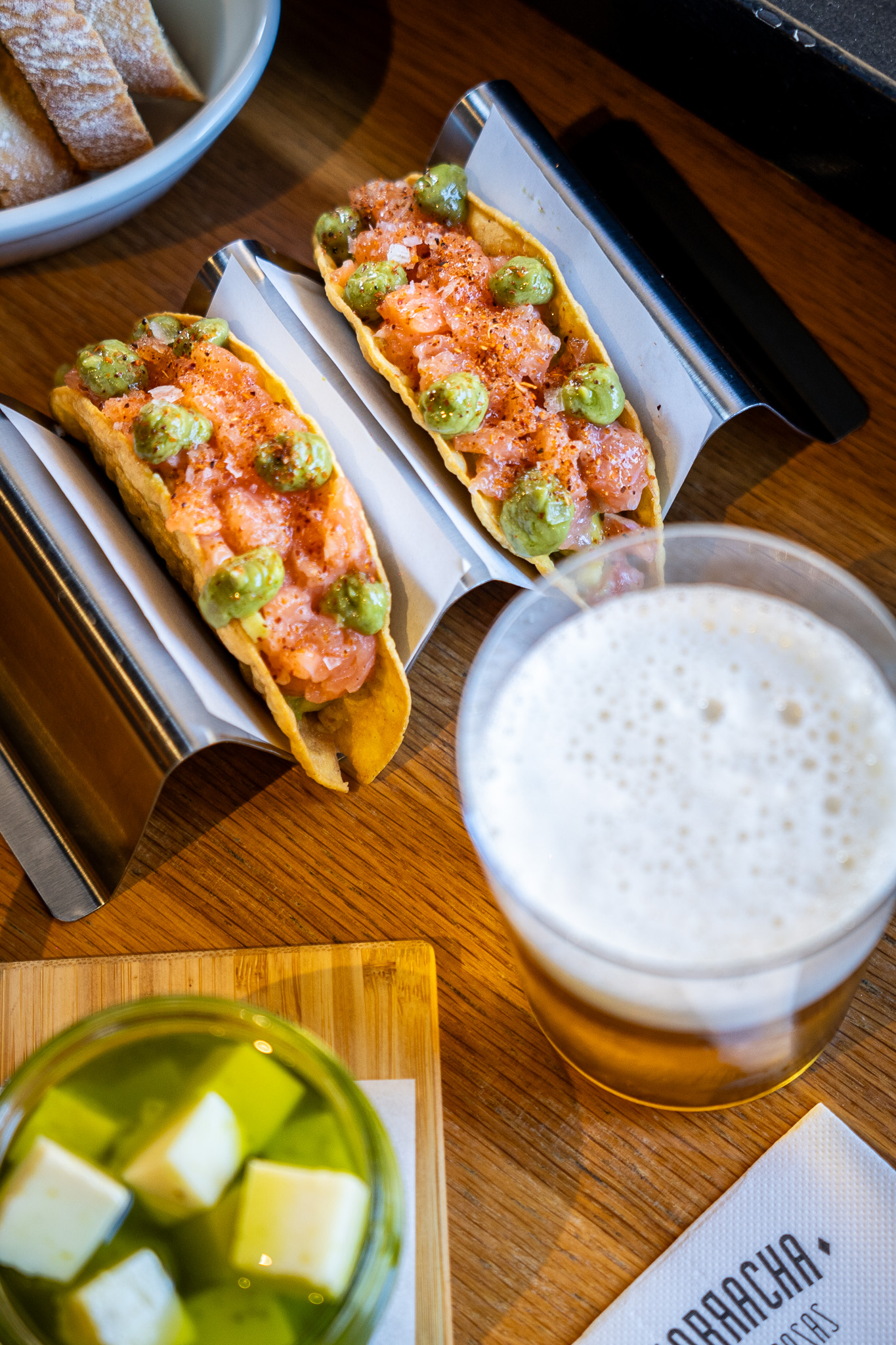 Crispy salmon taco with avocado cream and mango pico de gallo