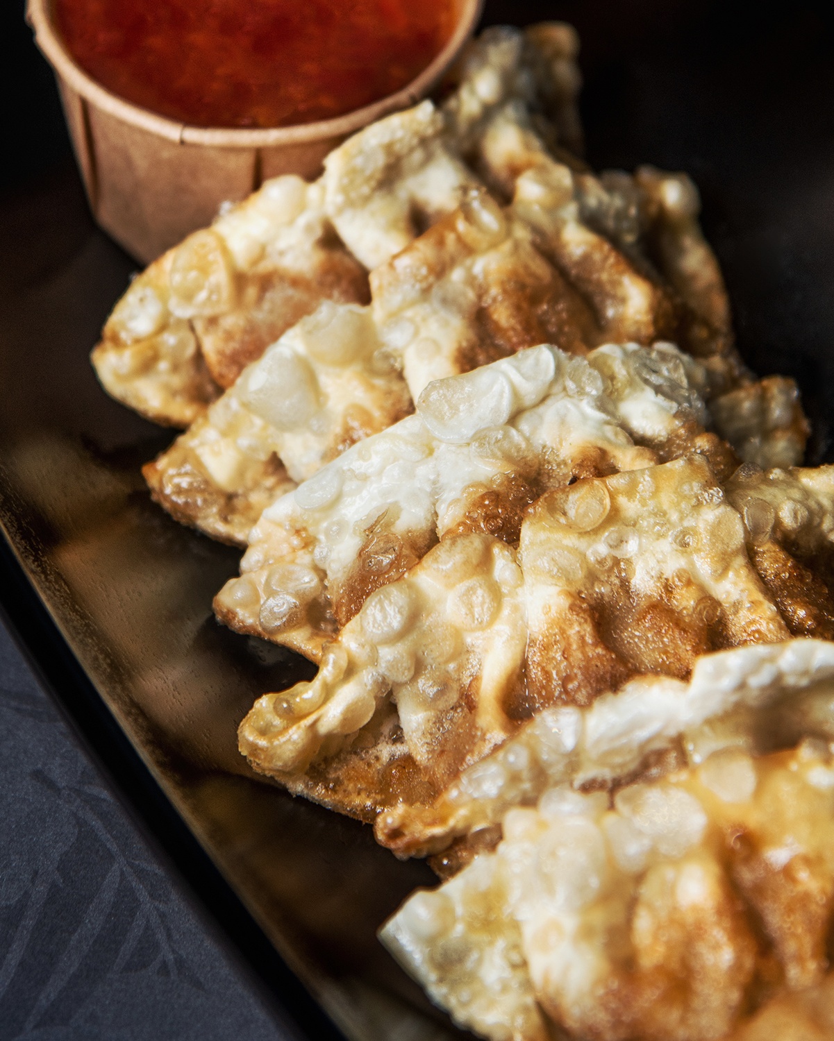 ‘Gyozas’ Japanese dumplings with chicken, veggies & sweet chili sauce