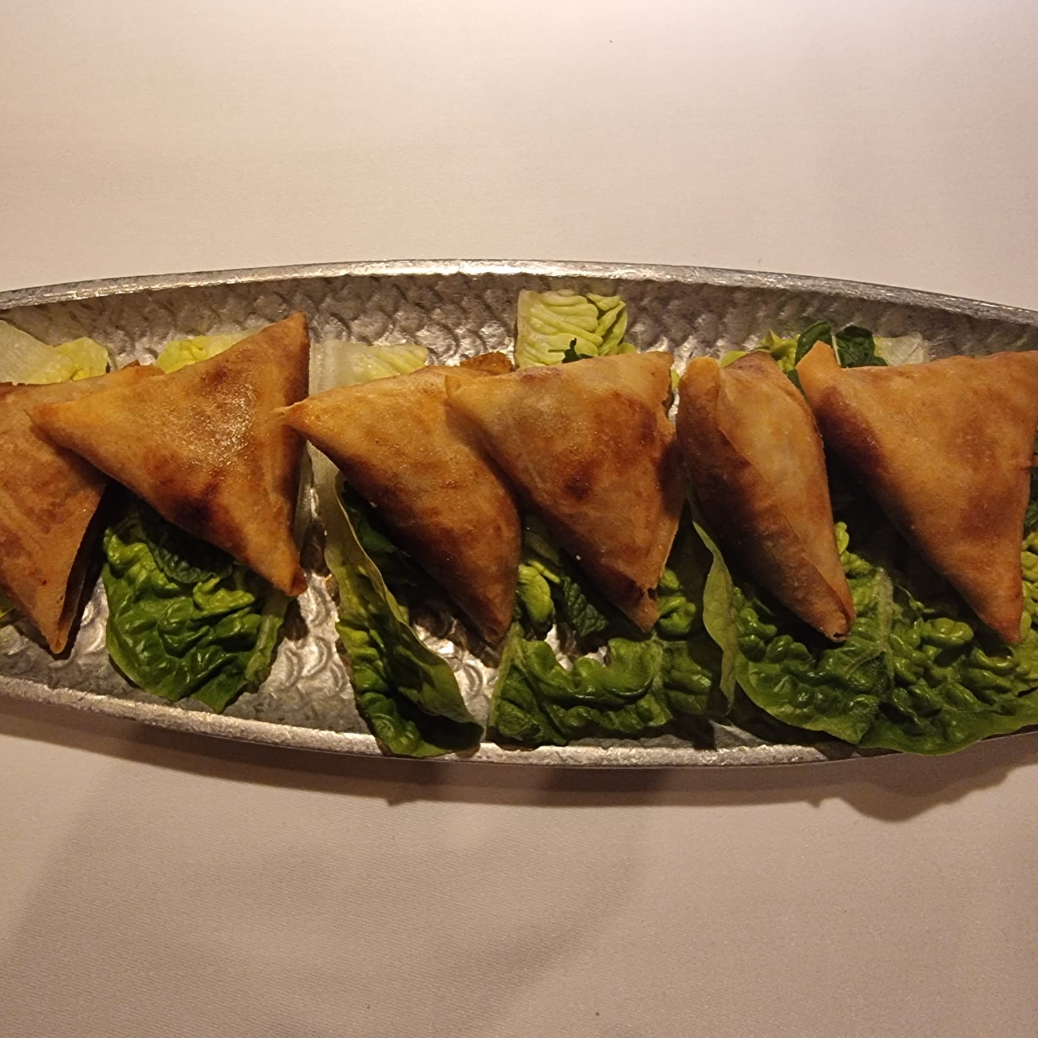 Samosa with caramelized onion & sultanas