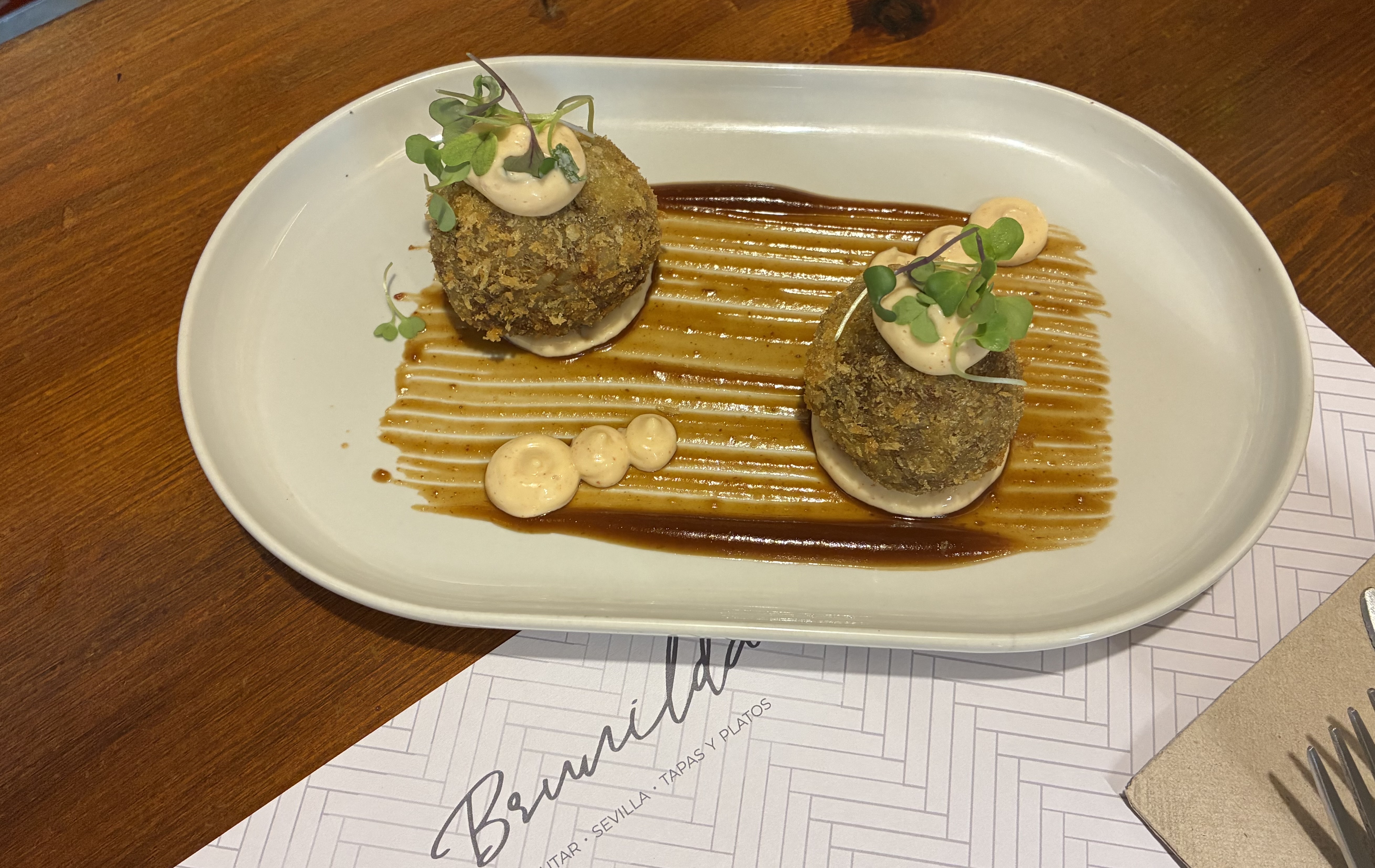  Rice, cheese, and pork cheek arancini with kimchi emulsion