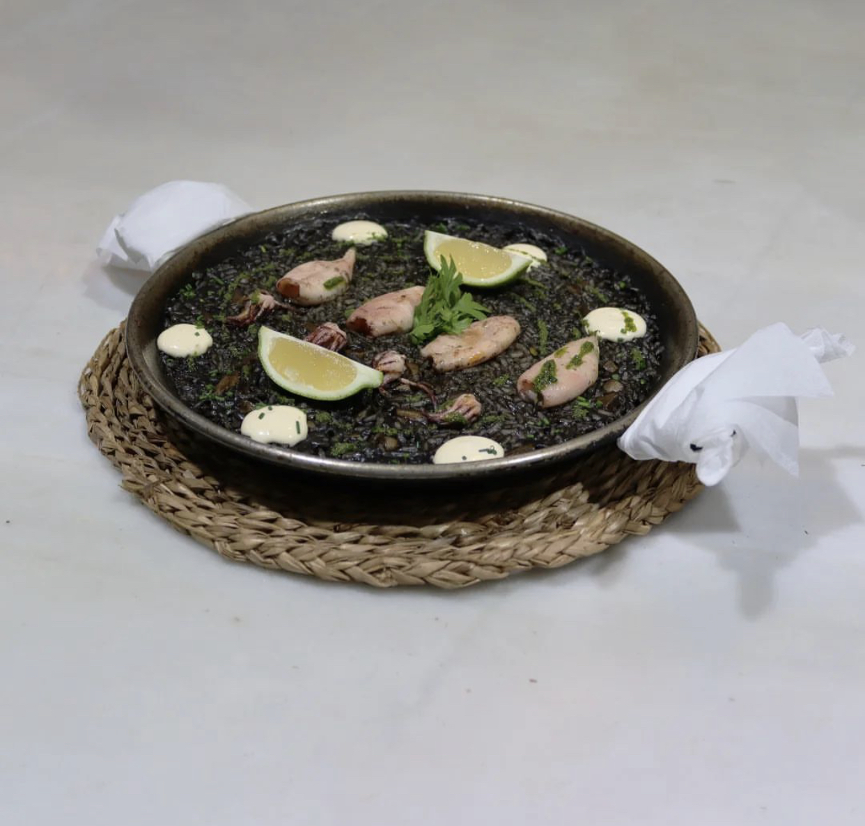 Arroz negro de chipirón  (precio por persona) 