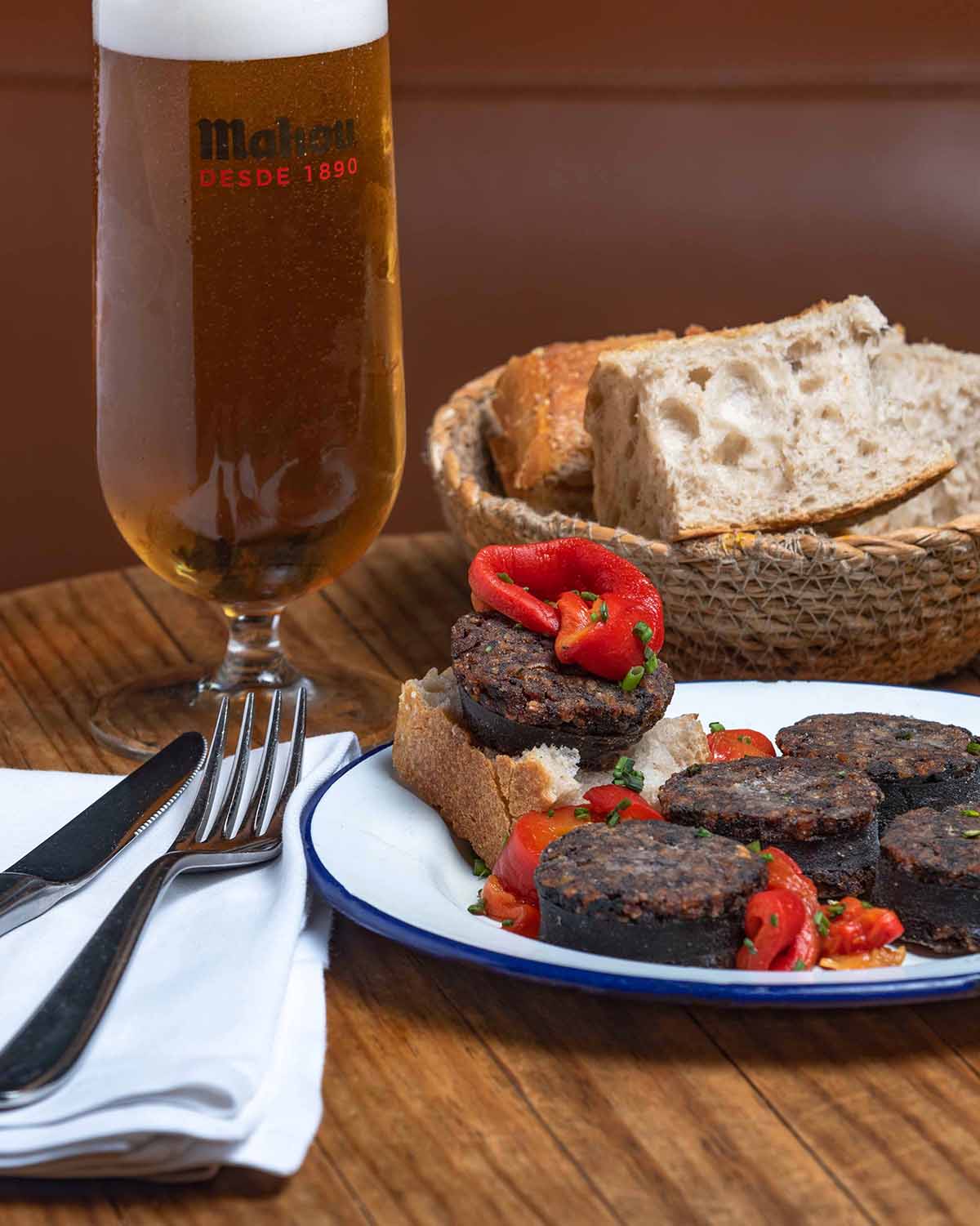 Black pudding from Burgos with caramelized peppers