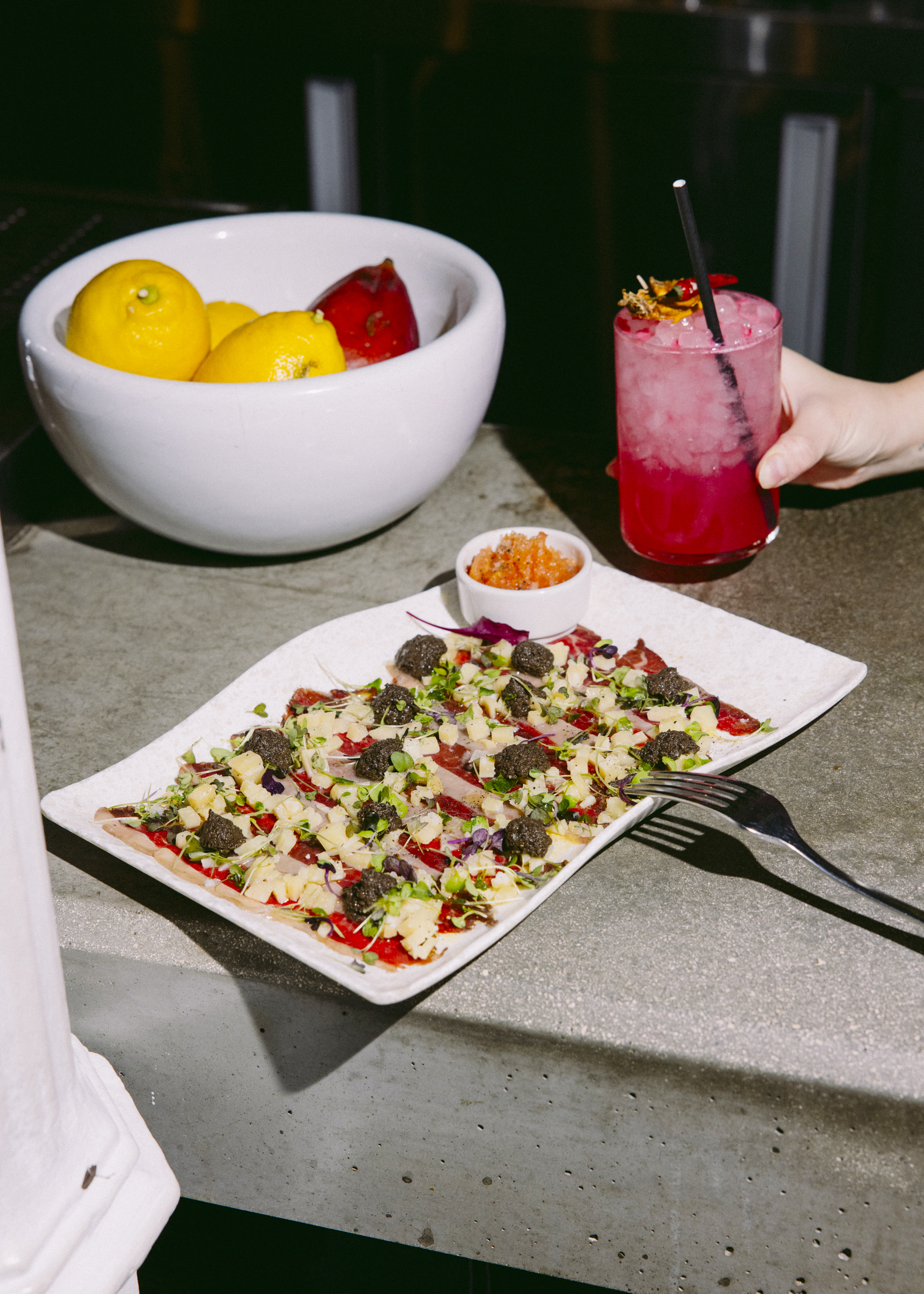 Picanha carpaccio with tomato, parmesan cheese and truffle