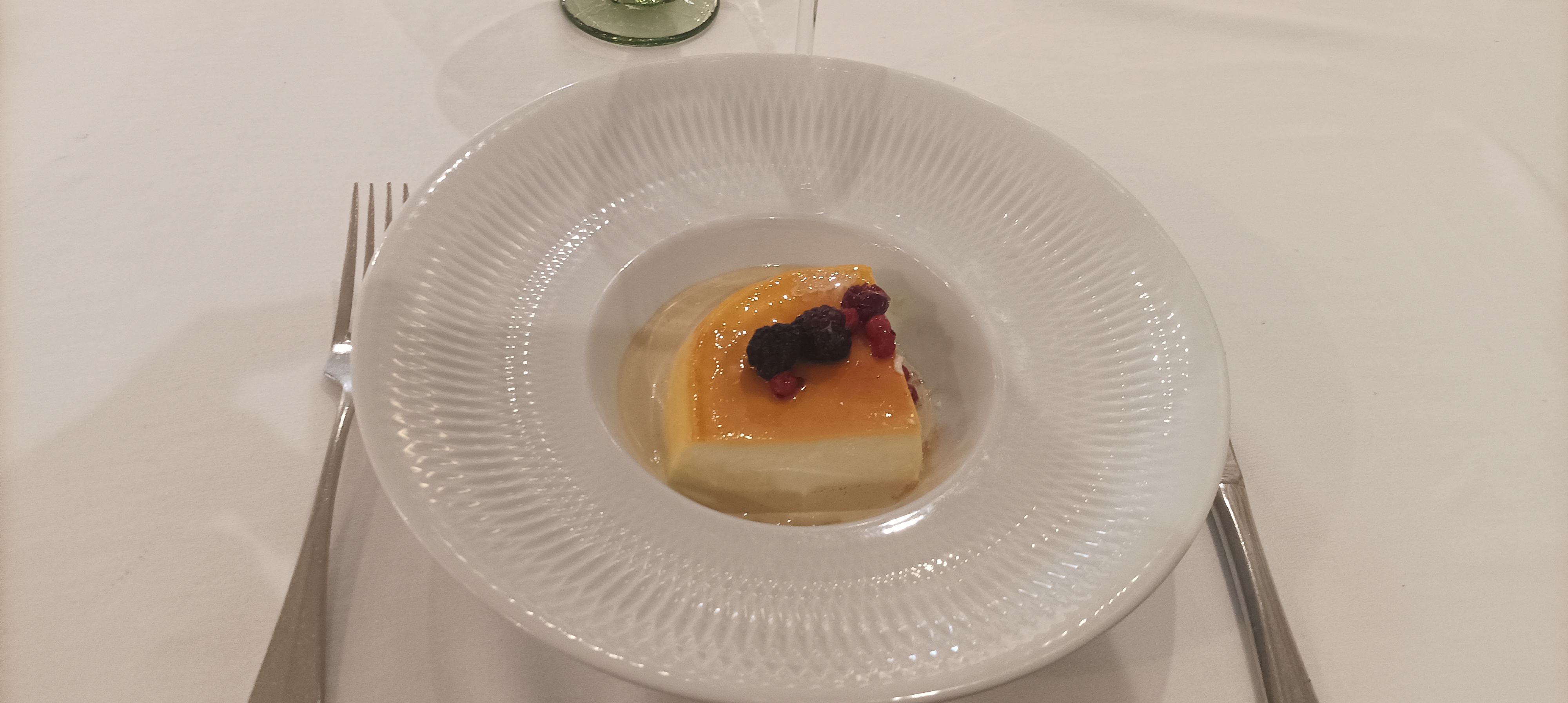 Panacotta with creamy coffee and red berries