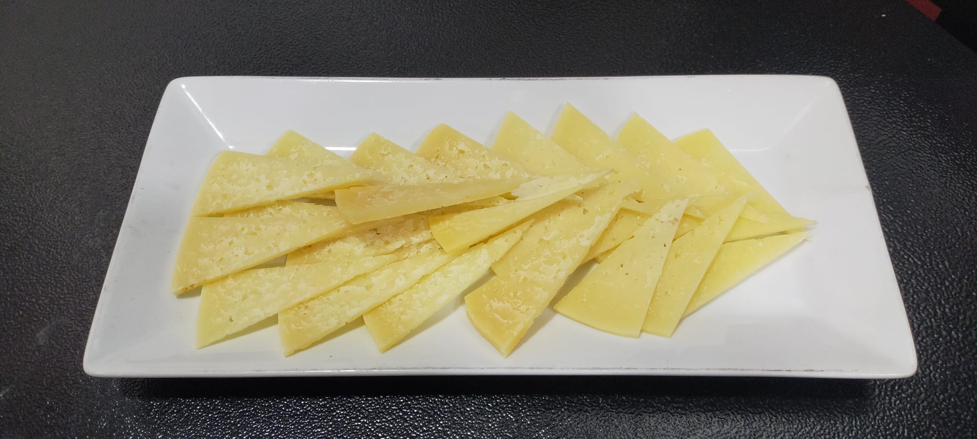 Portion of cured cheese