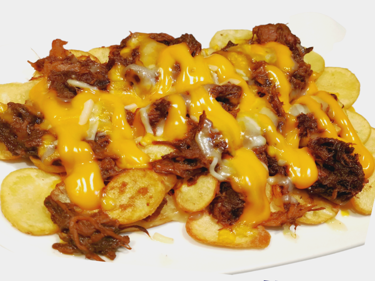 Fried potatoes with meat and cheese
