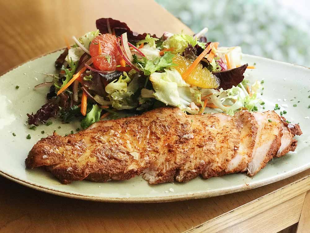 Slow roasted marinated chicken breast with summer salad