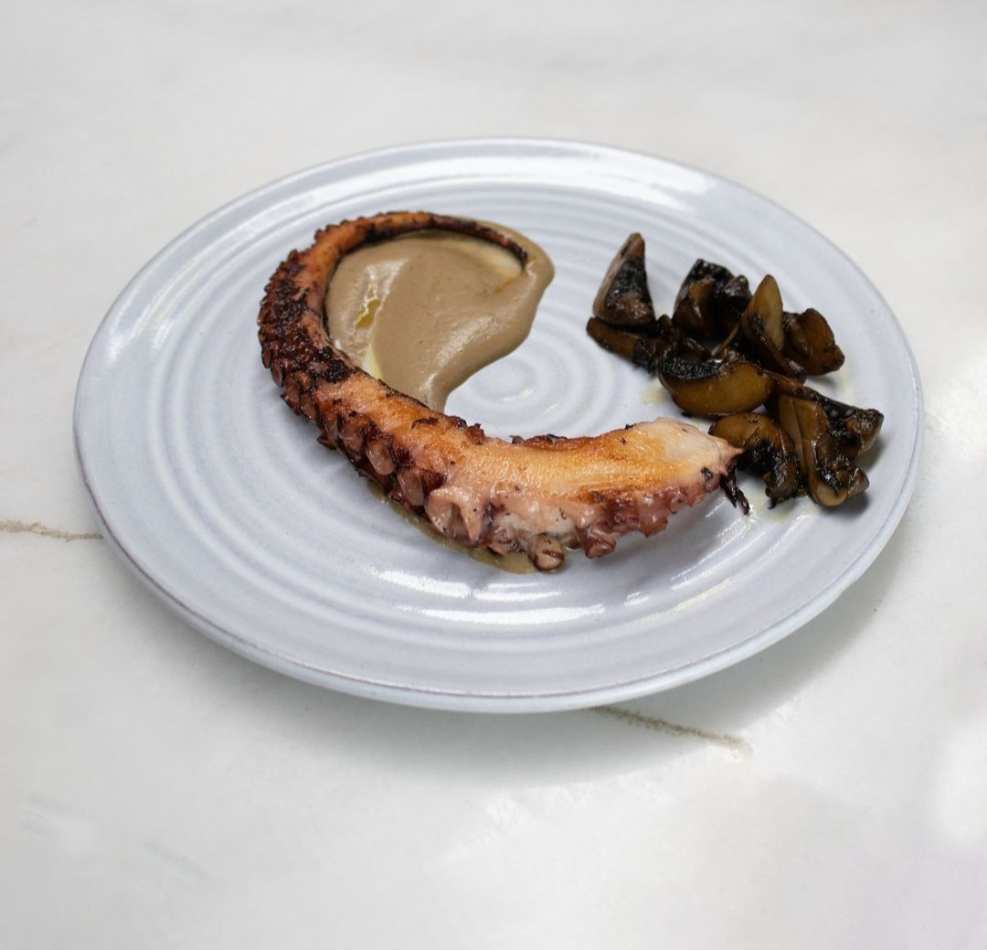 Octopus with boletus cream