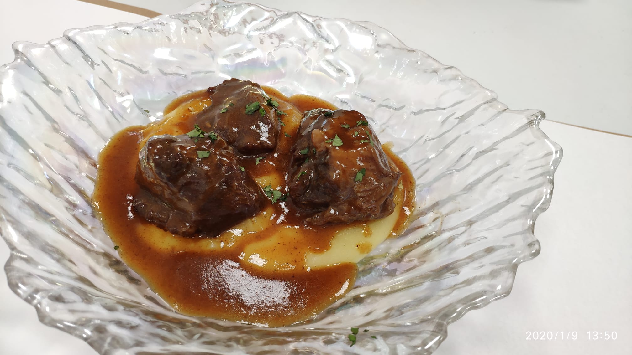 Pork cheeks cooked with red wine
