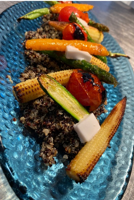 Warm black quinoa salad with grilled baby vegetables