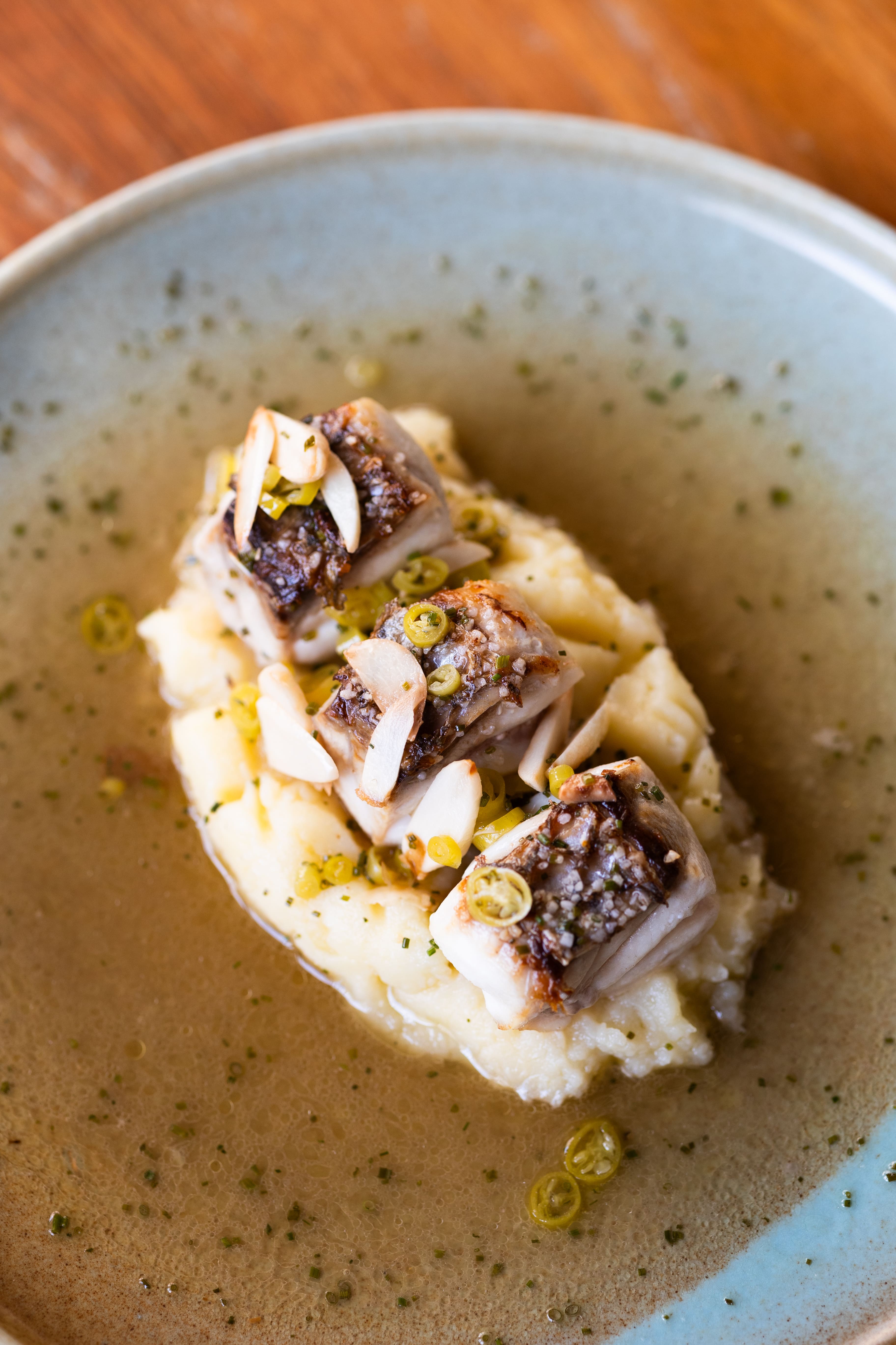 Fish of the day Bilbao style with lemon and potato puree