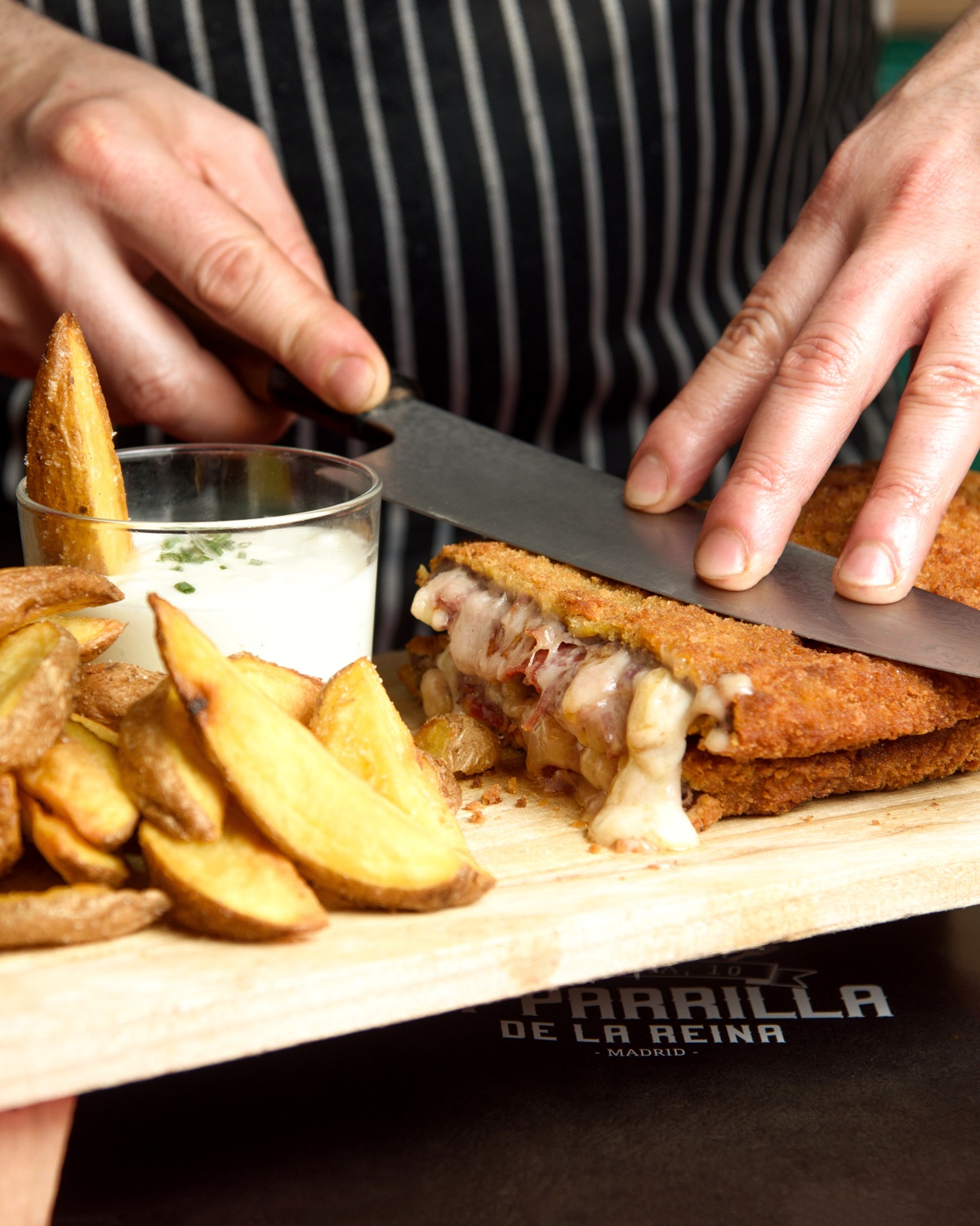 Cachopo of Asturian beef with fries accompanied by La Peral cheese sauce