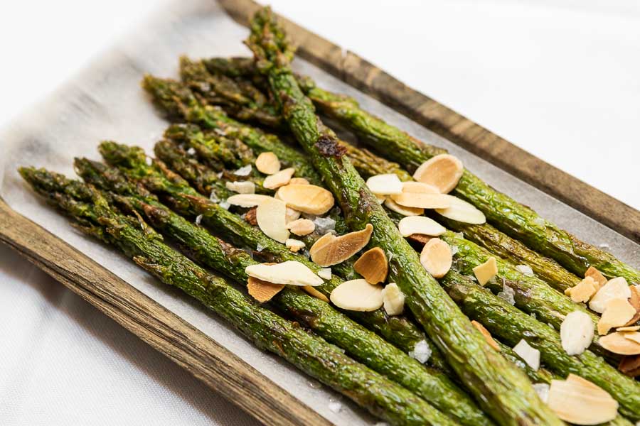 Fresh sautéed wild green asparagus with almonds