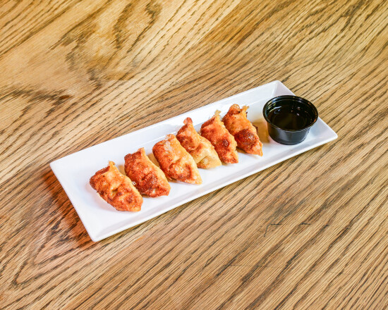 Gyozas de pato e vegetais 