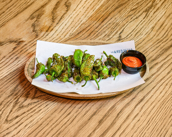 Padron peppers with romescu sauce