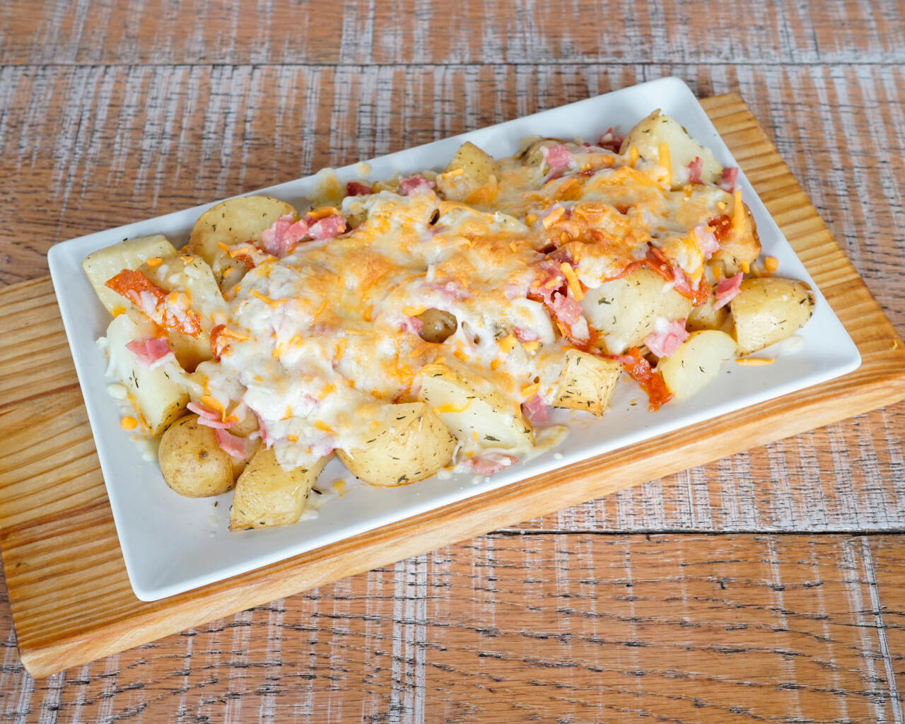 Potatoes with cheese, bacon and pepperoni