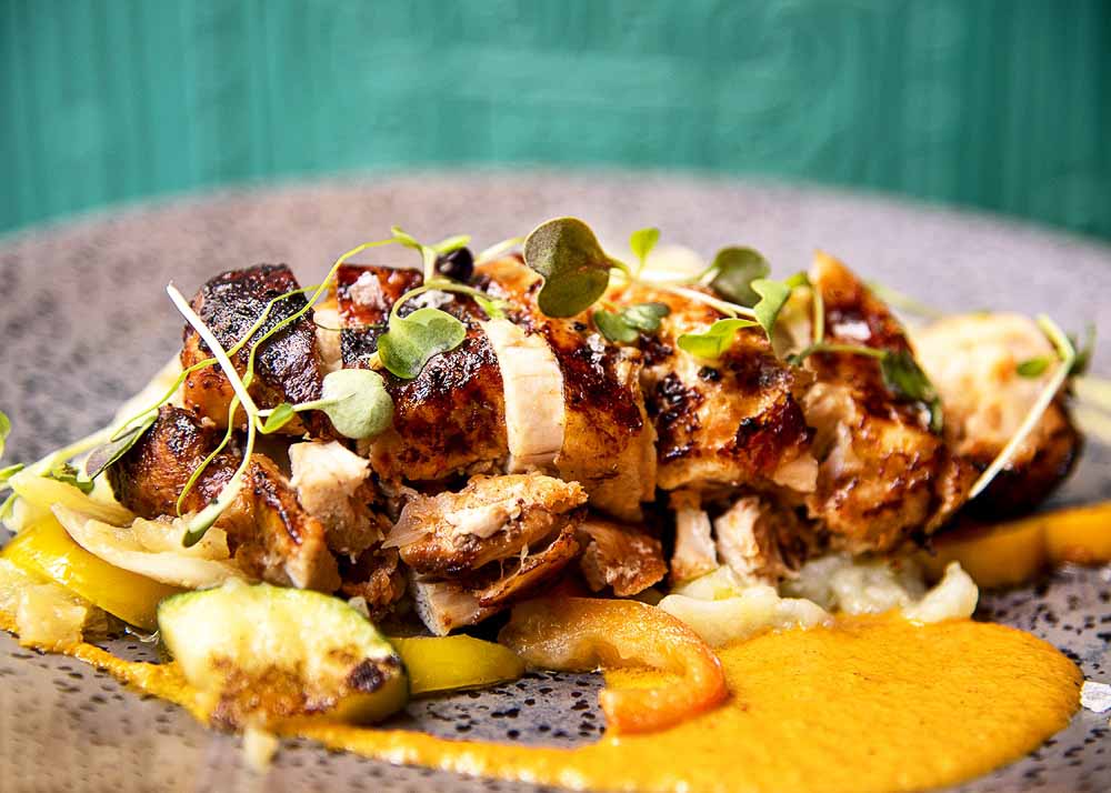 Baked chicken with potatoes and sauces