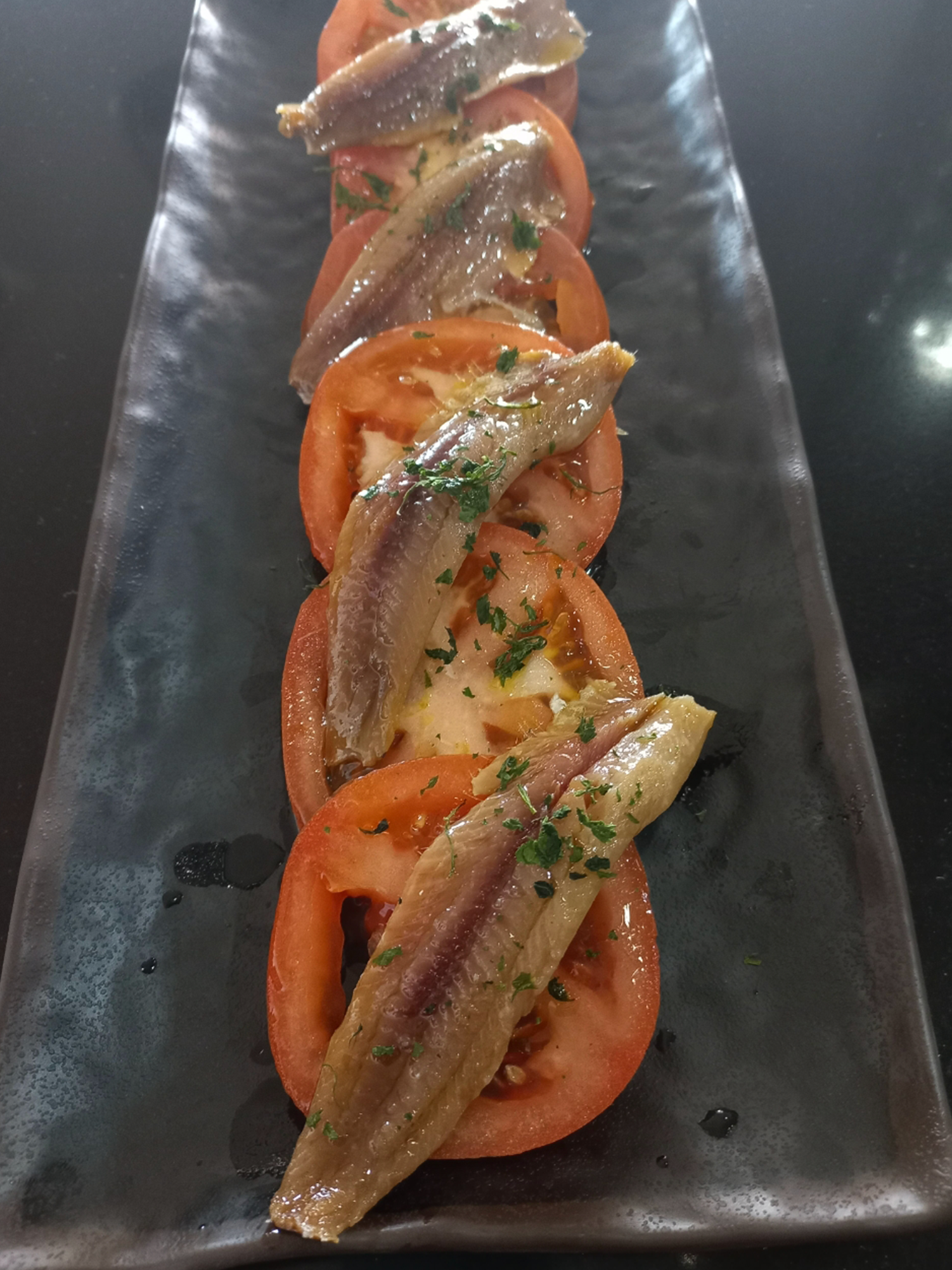 SEALED TOMATO WITH ANCHOVED SARDINE LOMITES